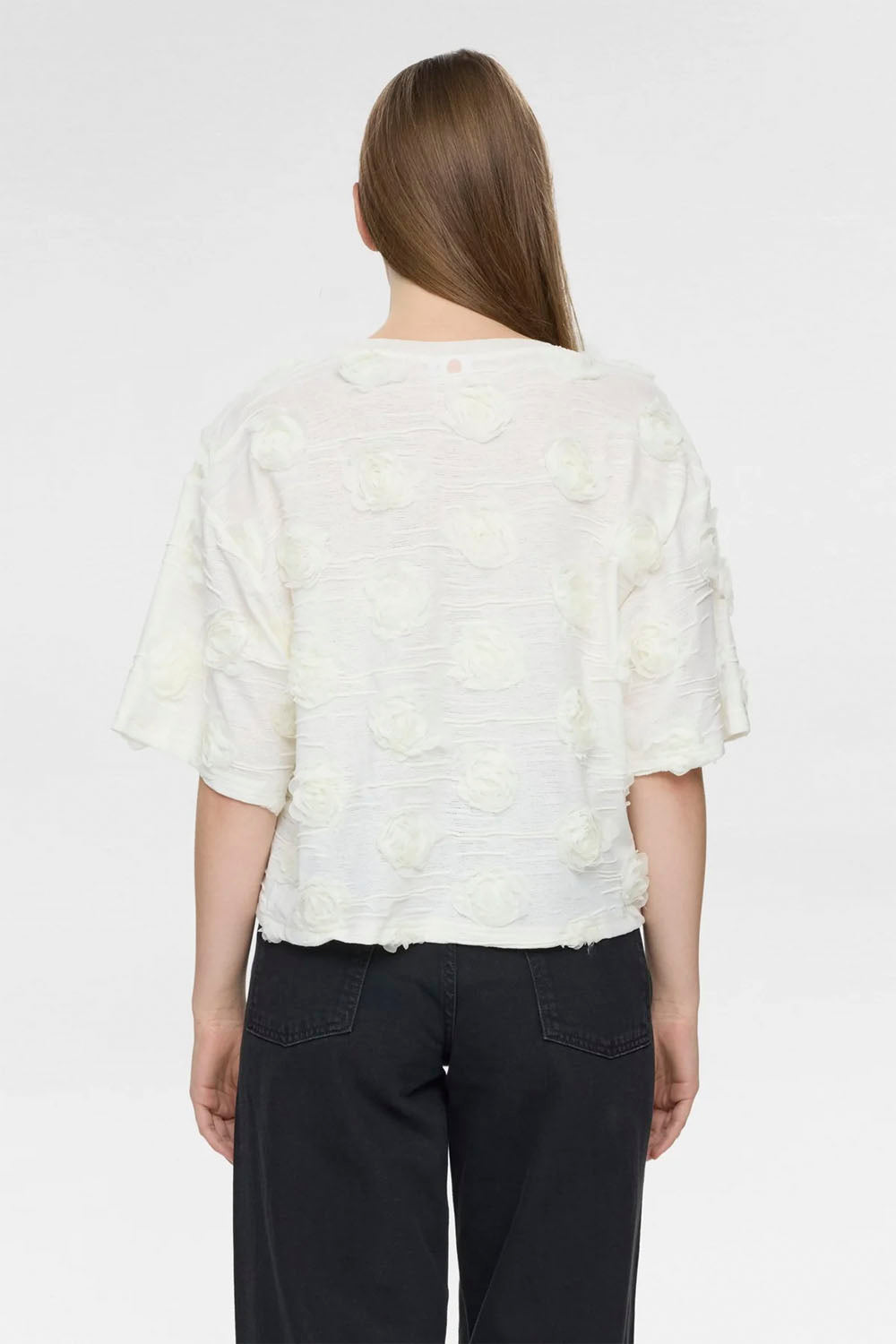 NÜMPH Nurosie T-Shirt in Cloud Dancer – women's relaxed fit white tee, available at Pukas Surf Shop