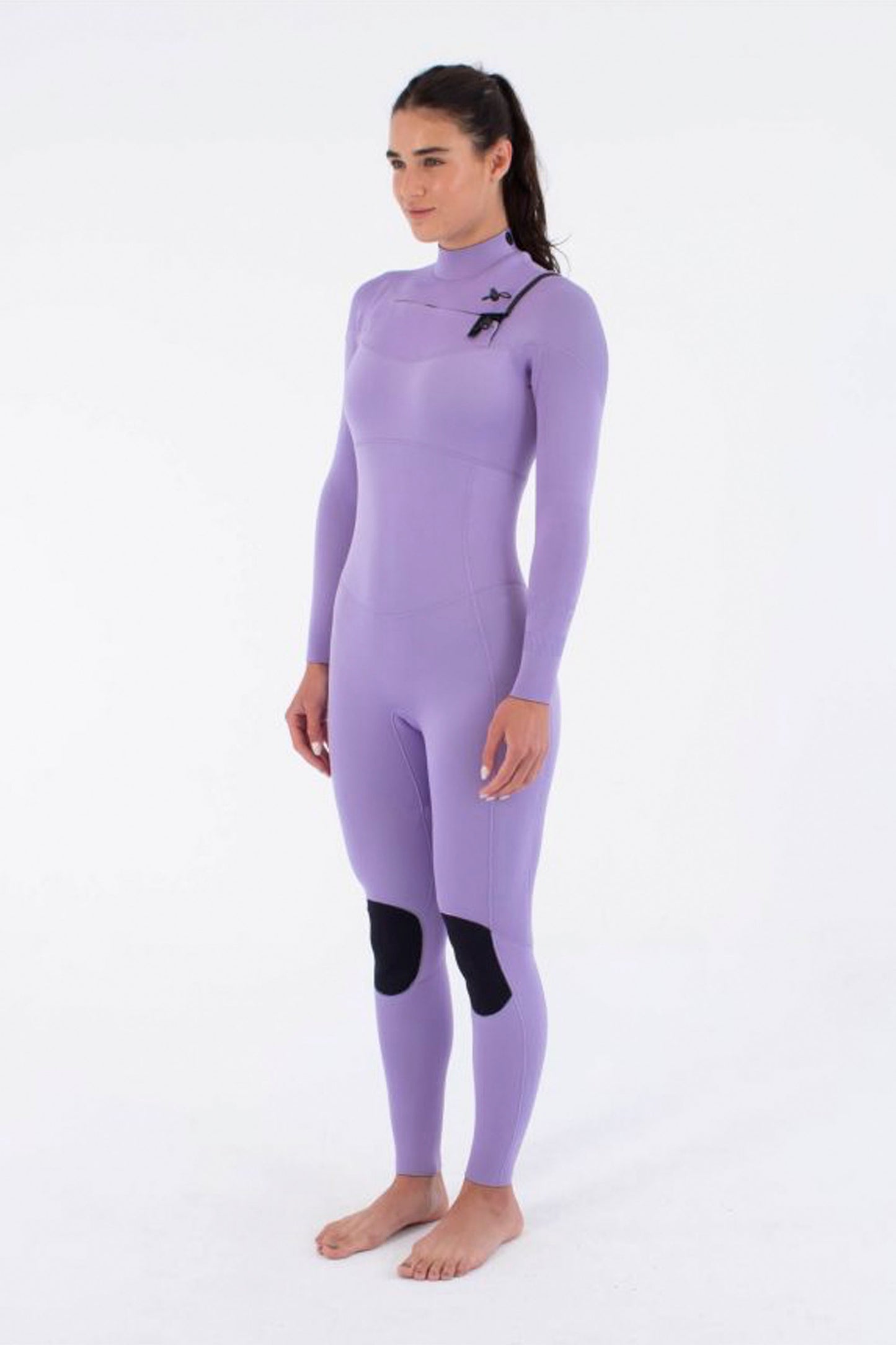 Person wearing a lavender HURLEY Air 3/2mm wetsuit with black patches on a white background