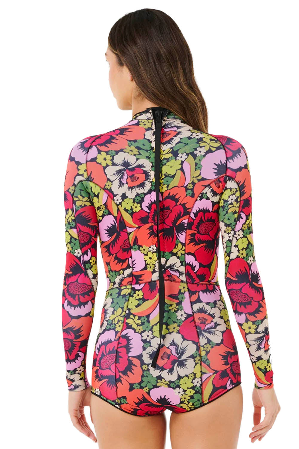 Woman wearing a colorful Rip Curl G-bomb 1.5mm back zip springsuit on a white background