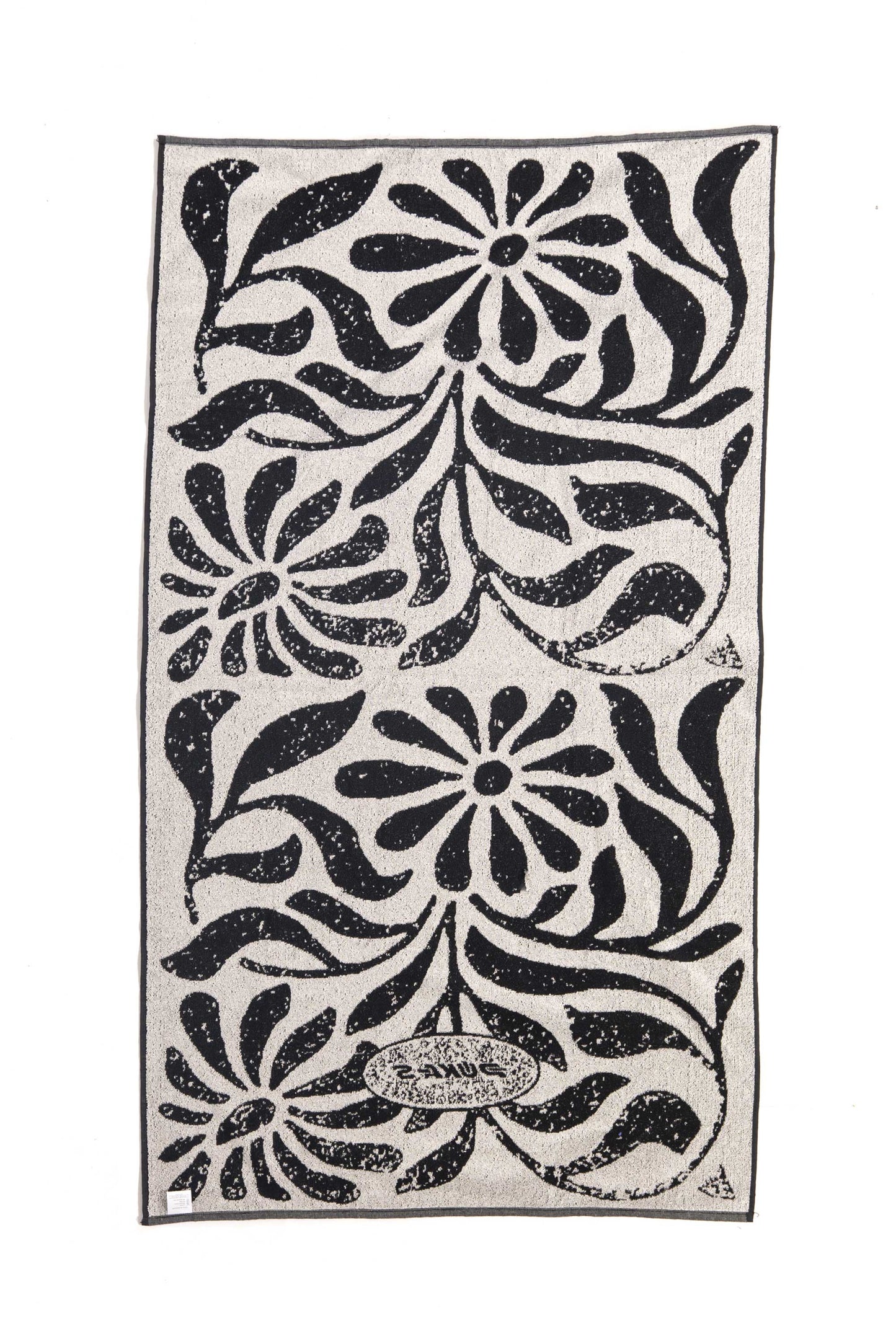 Pukas-Surf-Shop-pukas-towel-anemona-flower-black