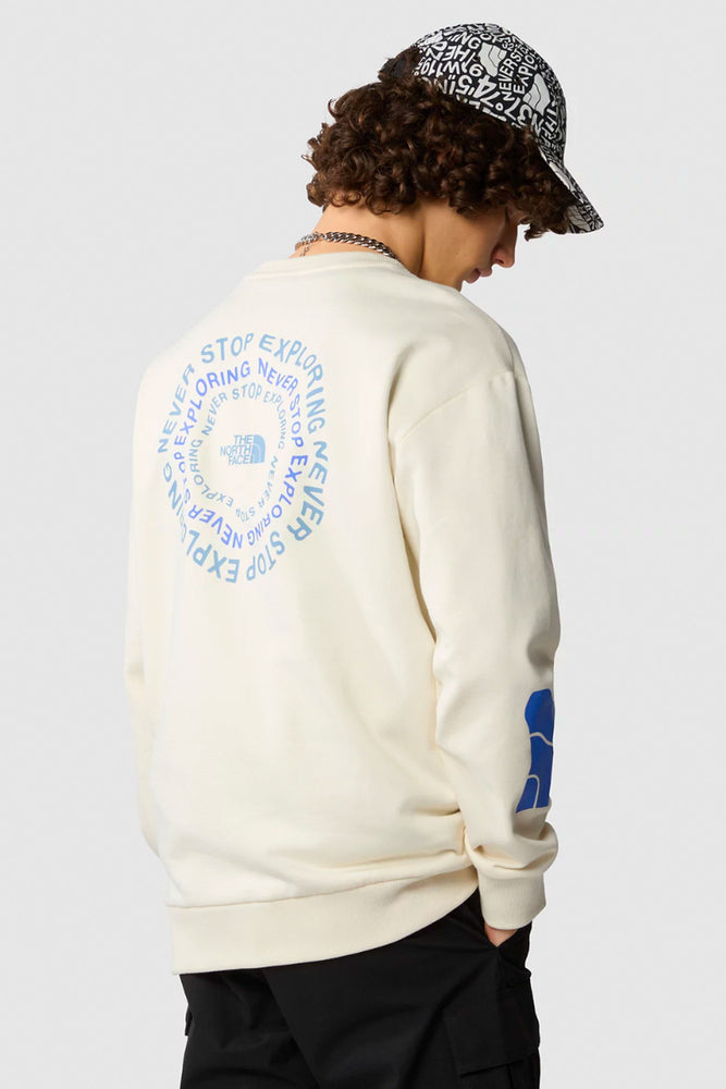 Pukas-Surf-Shop-the-north-face-ns-graphic-crew-hoodie-man-white-dune