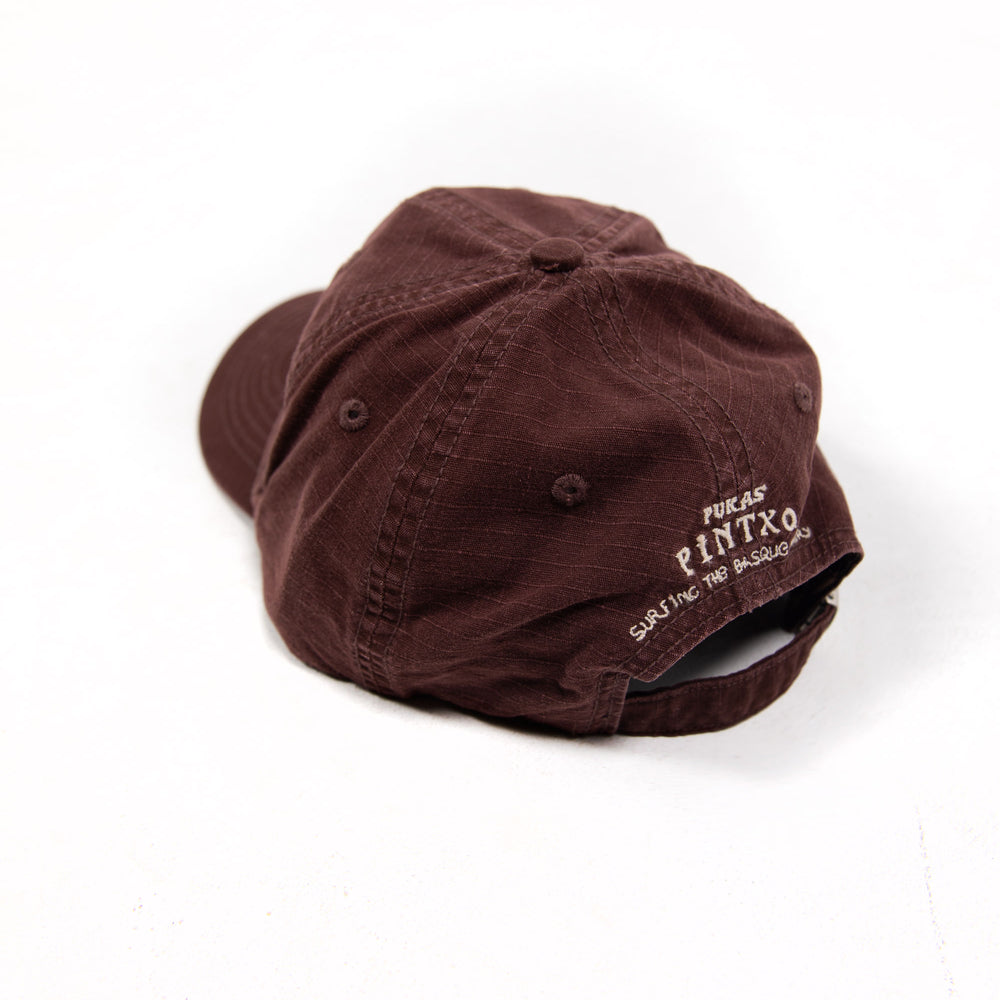 Pukas-surf-shop-cap-surfing-the-basque-country-Pintxo-brown