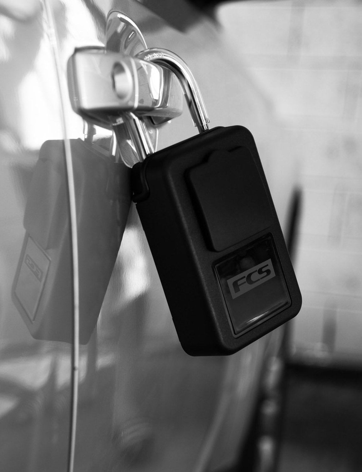 pukas surf shop - fcs -keylock