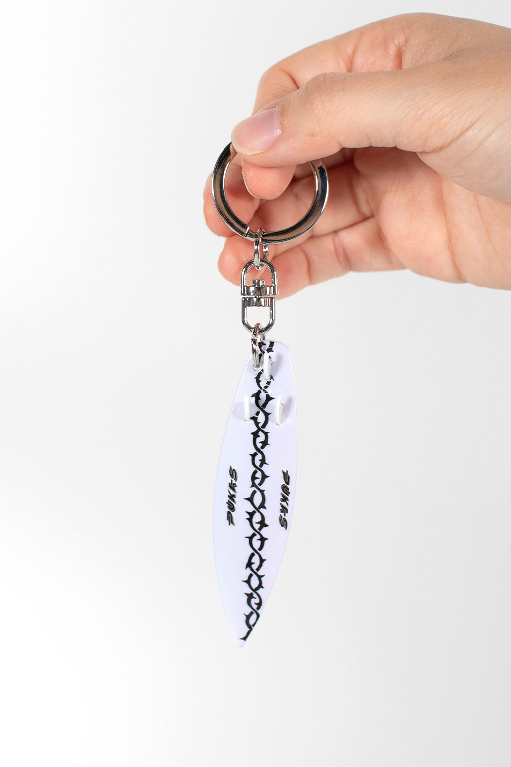 Pukas-Surf-Shop-Keychain-Spines