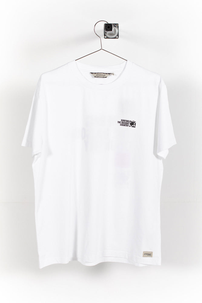 
                  
                    Pukas-Surf-Shop-Surfing-the-basque-country-white-tee-man
                  
                