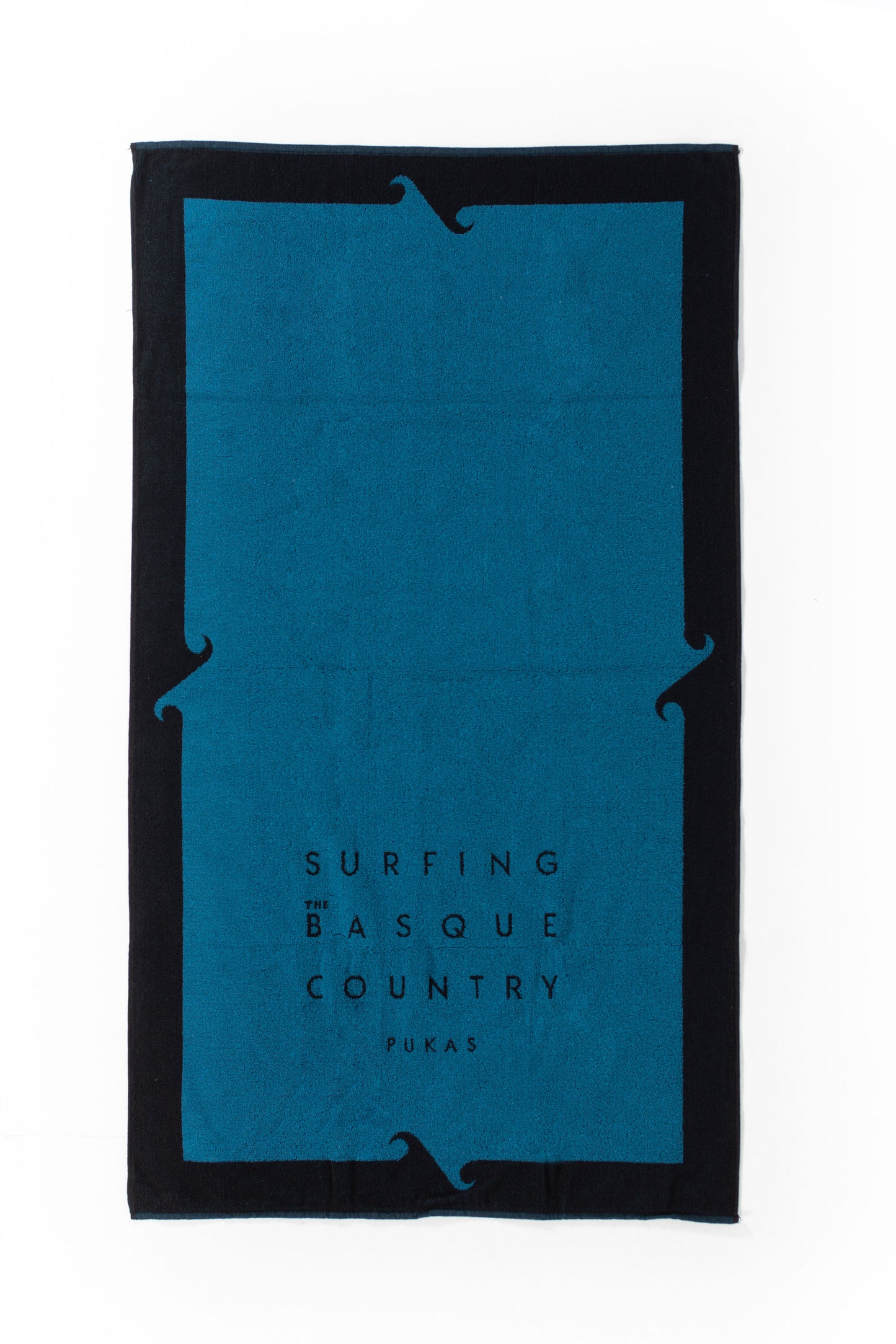 Pukas-Surf-Shop-Surfing-the-basque-country-towel-black-navy